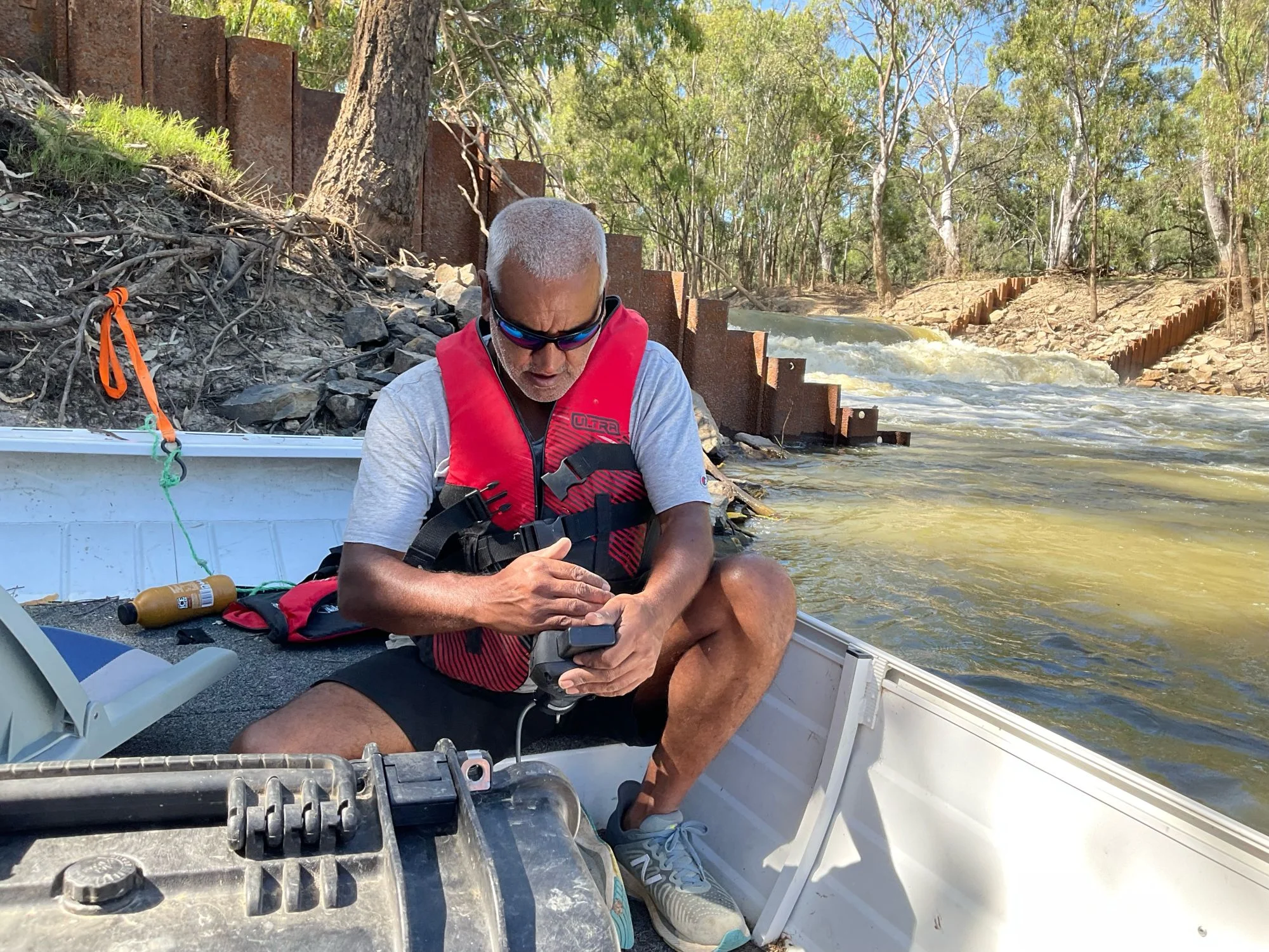 Anthony ‘Ant’ Jones, from Deniliquin, checks the readings on the water quality meter near one of the MIL irrigation escapes from the Mulwala channel, where environmental water has been used to create refuge patches in the Edward/Kolety River. Photo credit, Alec Buckley